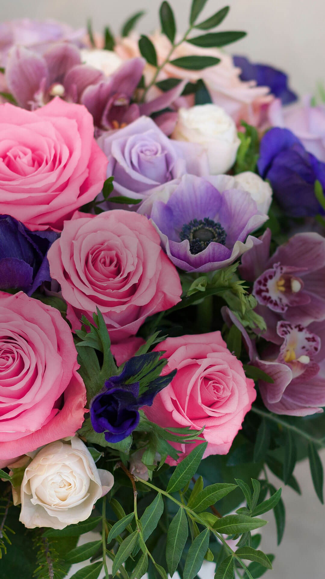 Portrait of a bouquet of blue, pink and purple flowers